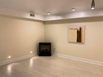 Three-level condominium offering space, flexibility, and a prime - photo 4