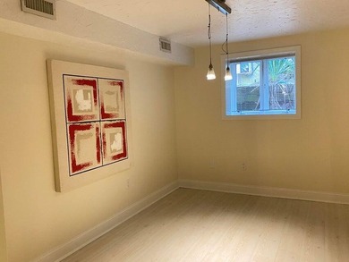 Three-level condominium offering space, flexibility, and a prime - photo 6