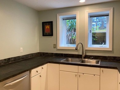 Three-level condominium offering space, flexibility, and a prime - photo 8