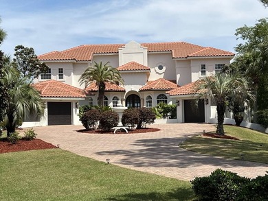 A magnificent custom Mediterranean estate situated on 100 ft of - photo 1