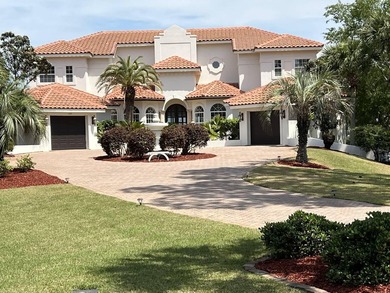 A magnificent custom Mediterranean estate situated on 100 ft of - photo 2