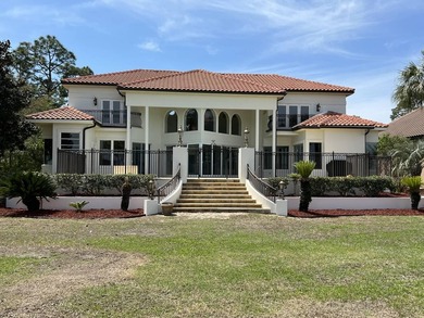 A magnificent custom Mediterranean estate situated on 100 ft of - photo 5
