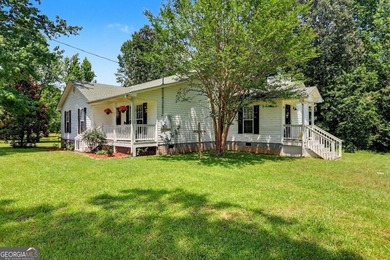 Welcome home to this charming ranch-style property offering the - photo 2
