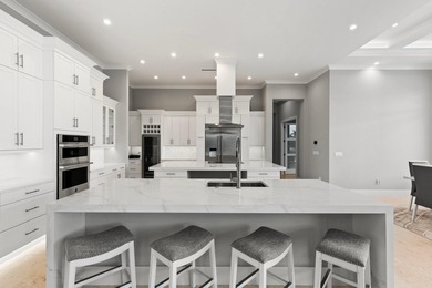 A Waterfront Masterpiece of Modern Island Living! Bold, fresh