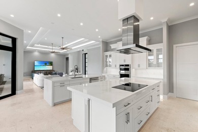 A Waterfront Masterpiece of Modern Island Living! Bold, fresh