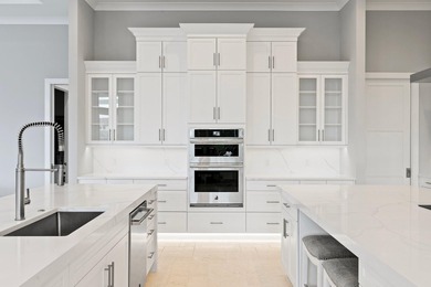 A Waterfront Masterpiece of Modern Island Living! Bold, fresh