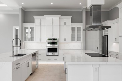 A Waterfront Masterpiece of Modern Island Living! Bold, fresh