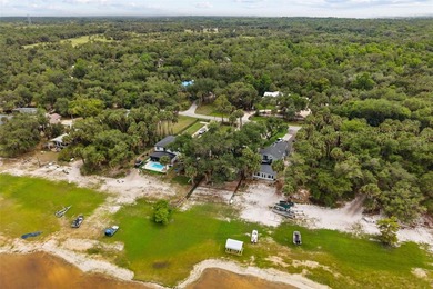 Nestled on a breathtaking .4-acre lot on beautiful Lake Harney - photo 29
