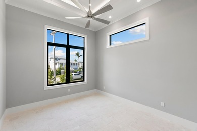 A Waterfront Masterpiece of Modern Island Living! Bold, fresh