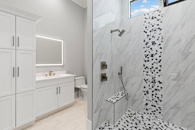 A Waterfront Masterpiece of Modern Island Living! Bold, fresh