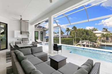 A Waterfront Masterpiece of Modern Island Living! Bold, fresh