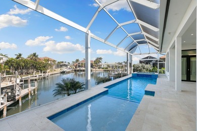 A Waterfront Masterpiece of Modern Island Living! Bold, fresh