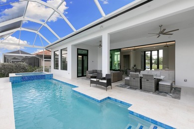 A Waterfront Masterpiece of Modern Island Living! Bold, fresh