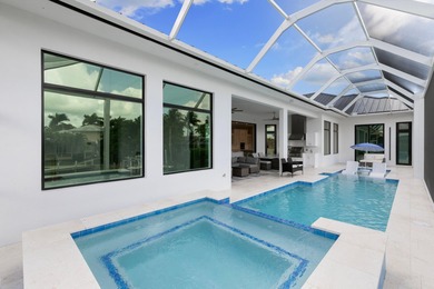 A Waterfront Masterpiece of Modern Island Living! Bold, fresh