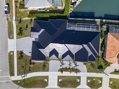 A Waterfront Masterpiece of Modern Island Living! Bold, fresh