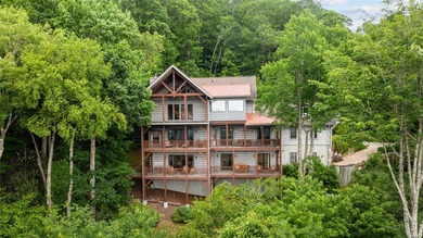 Perched above Lake Glenville with sweeping year-round views of - photo 5