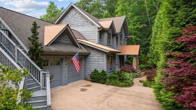 Perched above Lake Glenville with sweeping year-round views of - photo 6