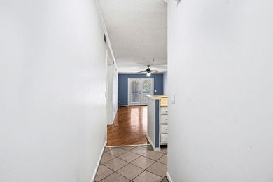Welcome to this charming two-bedroom, two-bathroom condo in the