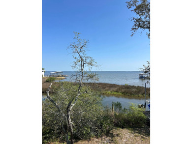 Canal Front Lot with wide open Bay views. This lot offers the - photo 1
