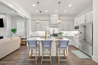 Experience the epitome of coastal luxury in this exceptional - photo 8