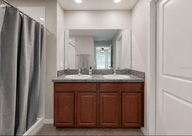 Situated on a perfectly manicured lot with serene and private - photo 22