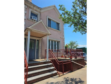 Rare opportunity! Oversized brick two-family home measuring 20' - photo 3