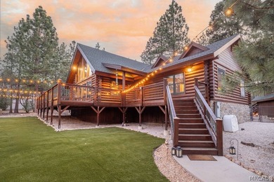 Nestled among the pines on a beautifully wooded acre, this - photo 4