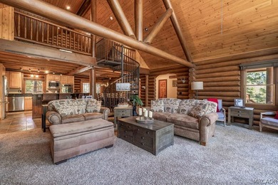 Nestled among the pines on a beautifully wooded acre, this - photo 8