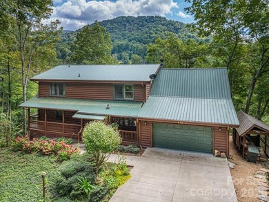 This warm and inviting, solidly built custom log home is - photo 1