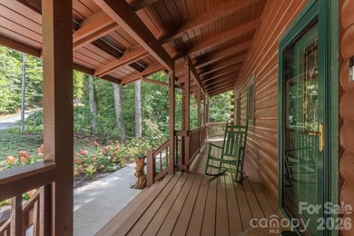 This warm and inviting, solidly built custom log home is - photo 3