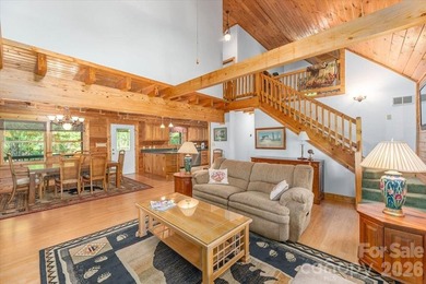 This warm and inviting, solidly built custom log home is - photo 6