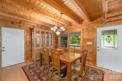 This warm and inviting, solidly built custom log home is - photo 7