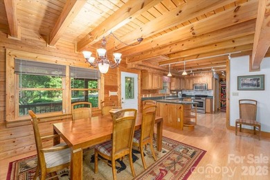 This warm and inviting, solidly built custom log home is - photo 8