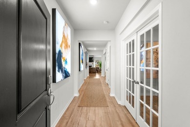 Set on a quiet cul-de-sac in The Preserve at Pine Lakes, 5666