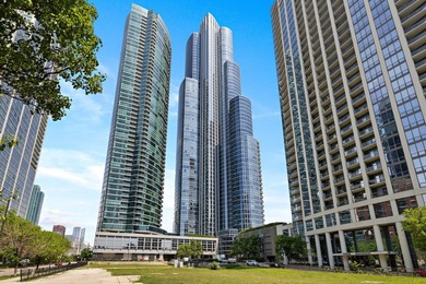 Welcome to 1211 S Prairie Ave, Unit 3205, where elevated city - photo 1