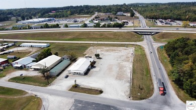 Commercial building and large tract located at the corner of 65 - photo 3
