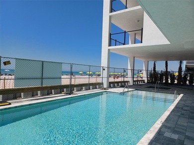 Virtually Staged. GULF FRONT - Spectacular new building on - photo 41