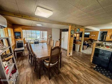 4 bedroom, 1 bath home with a huge covered area perfect for - photo 5