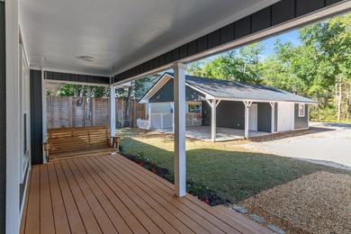 75' of canal frontage sets the stage for easy waterfront living - photo 4