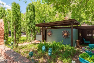Set beneath the canopy of mature pines and just steps from the - photo 15