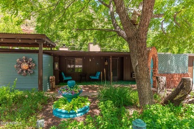 Set beneath the canopy of mature pines and just steps from the - photo 16