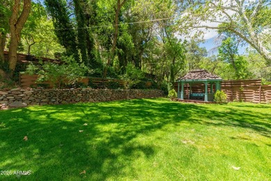 Set beneath the canopy of mature pines and just steps from the - photo 18