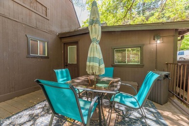 Set beneath the canopy of mature pines and just steps from the - photo 24