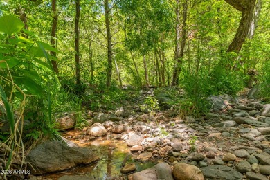 Set beneath the canopy of mature pines and just steps from the - photo 26