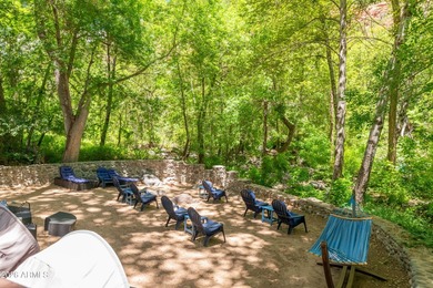 Set beneath the canopy of mature pines and just steps from the - photo 29