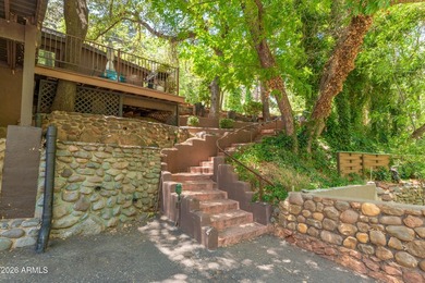 Set beneath the canopy of mature pines and just steps from the - photo 30