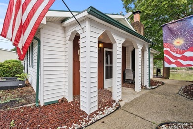 This two bedroom, one bathroom lakehouse is all about time well - photo 2