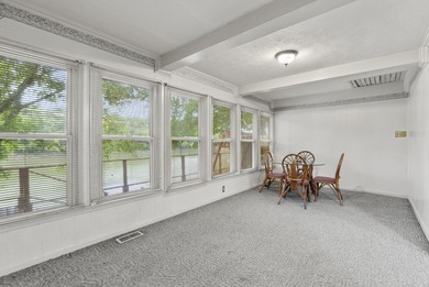 This two bedroom, one bathroom lakehouse is all about time well - photo 9