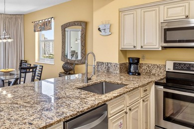 Back on the market with a new price, this Gulf-front 2-bedroom - photo 3