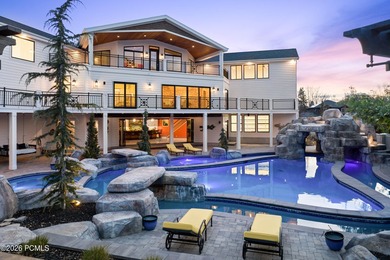 A $1,000,000 price adjustment now positions this residence as - photo 1